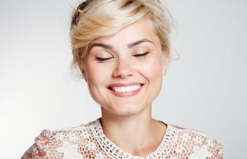 happy woman with closed eyes