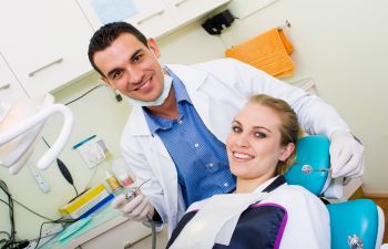 Dentist with a patient Johns Creek, GA, 