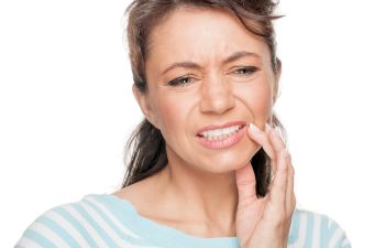 woman suffering from toothache Johns Creek, GA, 